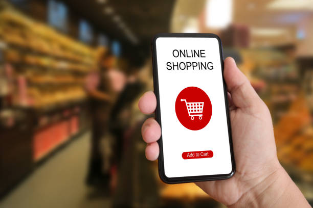 istock E-commerce internet shopping cart mobile phone app supermarket 986414842