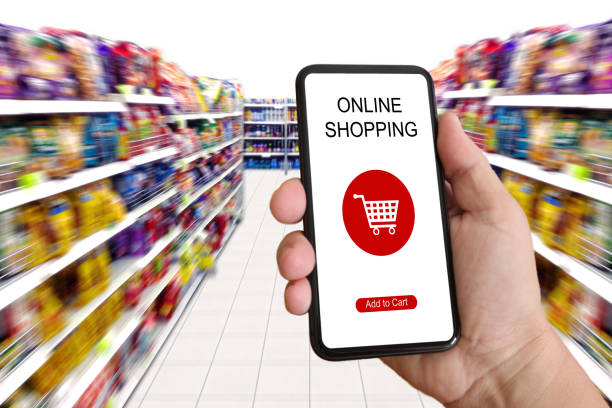 istock E-commerce internet shopping cart mobile phone app supermarket 986414964