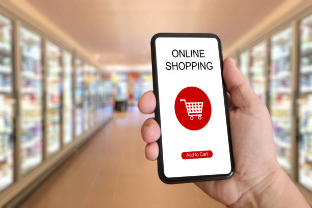 istock E-commerce internet shopping cart mobile phone app supermarket 986415128