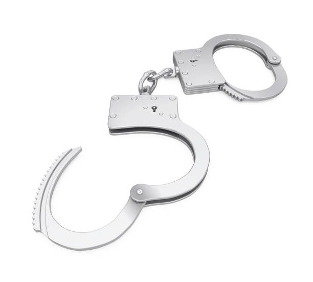 istock Metal Handcuffs Isolated 986418158