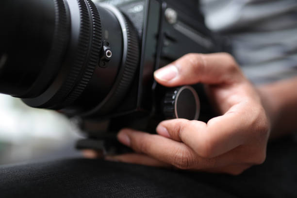 istock Old fashioned camera with high quality film. 986433040
