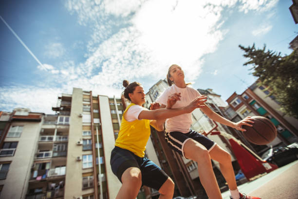 istock Woman playing basketball 986433482