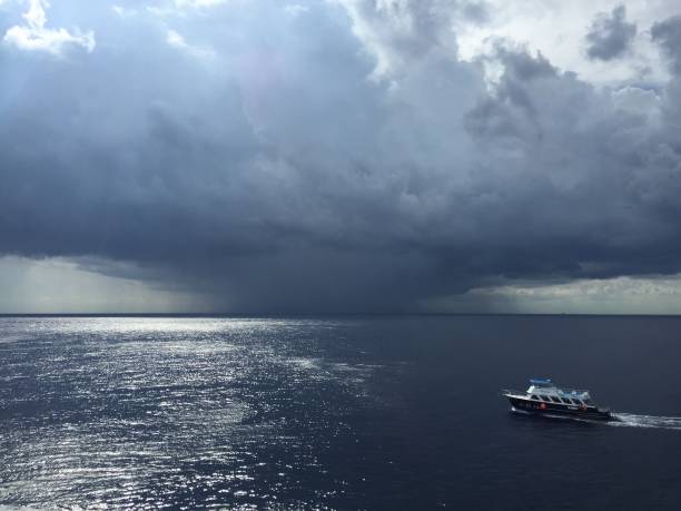 istock boat sailing in the open sea 986449608