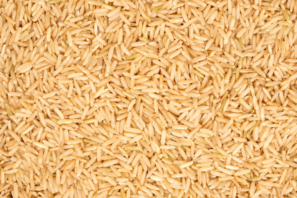istock the organic brown rice texture background 986460026