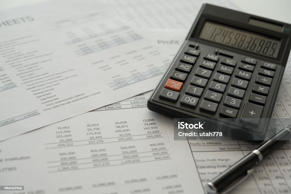 accounting audit bookkeeping accounting concept. calculator on financial statement and balance sheet annual. Bank Statement Stock Photo