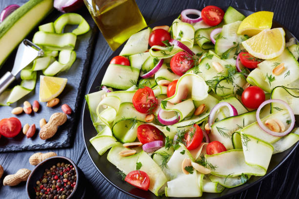istock savory zucchini ribbon salad, top view 986464946