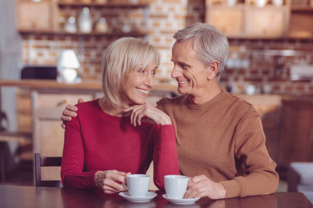 istock Cheerful blonde female keeping smile on face 986465844