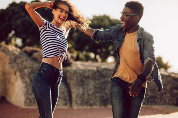 istock Young people having a great time outdoors 986469284