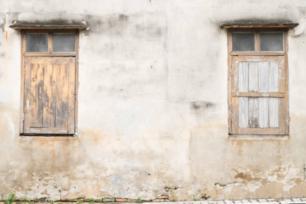 Closed old brown windows of historic house