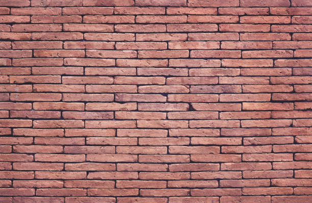 istock Old grungy texture, red brick wall with vintage style pattern for background and design art work. 986486008