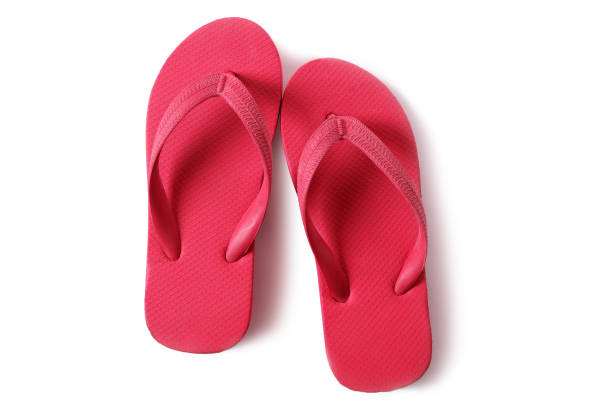 Red flip-flop isolated on white.