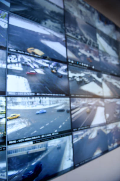istock Detail shot with security surveillance monitors command center 986504628