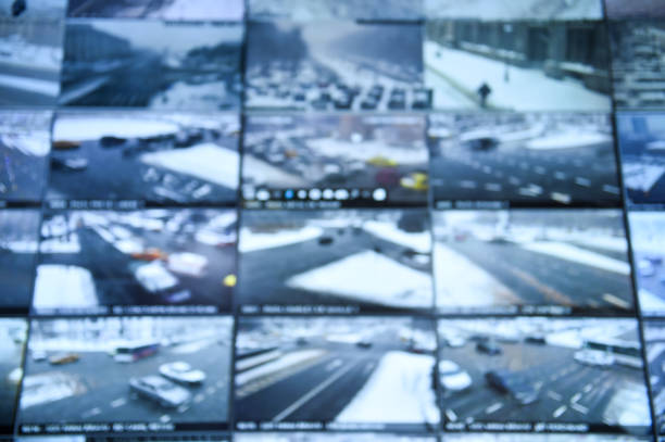istock Detail shot with security surveillance monitors command center 986504630