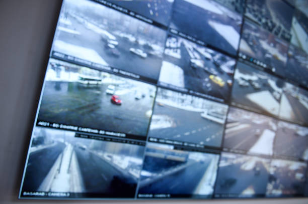 istock Detail shot with security surveillance monitors command center 986504632