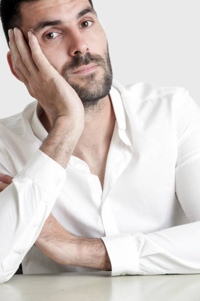 istock Portrait of young attractive bearded man, studio headshot 986514370