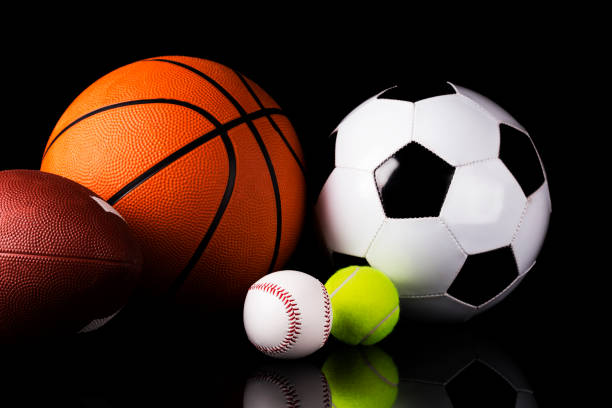 istock Sport balls on black background 986514410