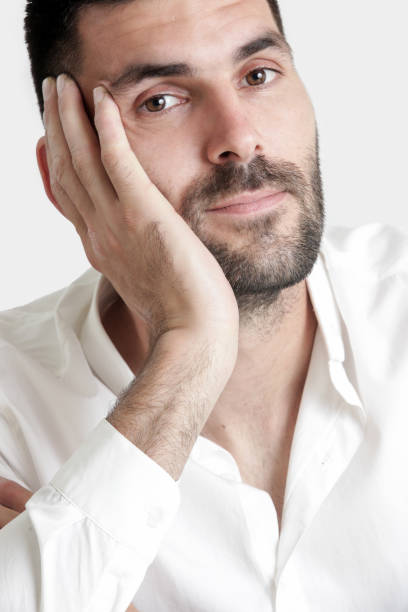 istock Portrait of young attractive bearded man, studio headshot 986514446