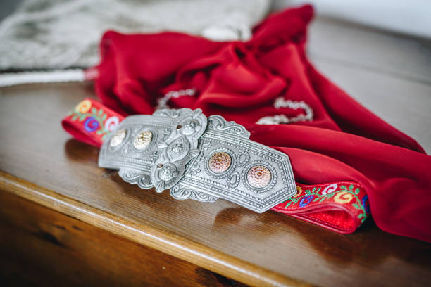istock Traditiona Bulgarian accessoires for the belt ( Belt Buckles /Pafti/ ) and a red scarf 986535406