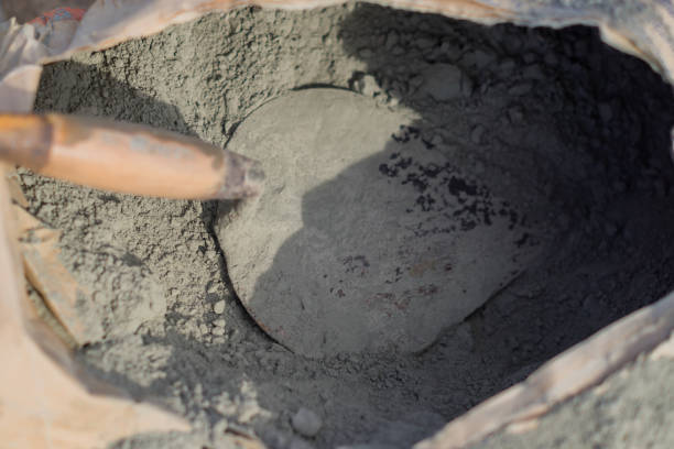 istock cement powder in paper bag  close up 986537098