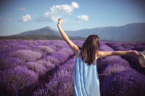 istock Young woman at a lavender field 986537232