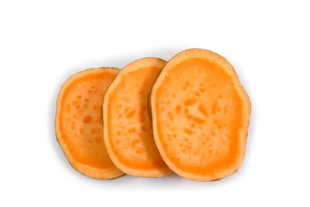 Top view of sliced sweet potato isolated on white background with clipping path.