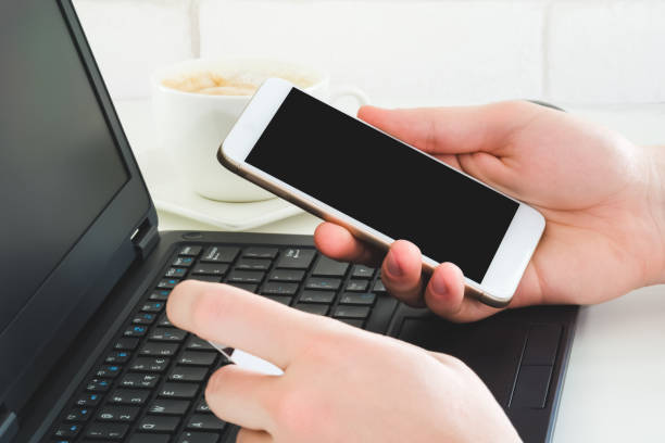 istock Man using smartphone and credit card to make online payment 986556474