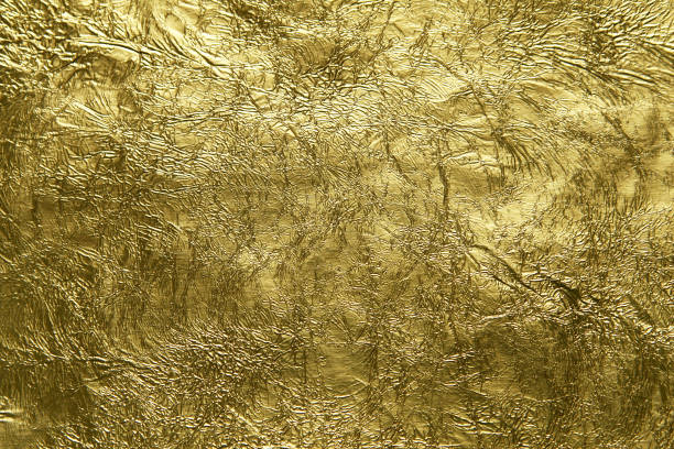 istock Shiny gold foil suitable for a luxurious design or background 986557450
