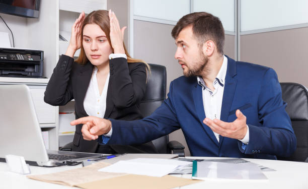 istock Frustrated female and male sales managers 986566378