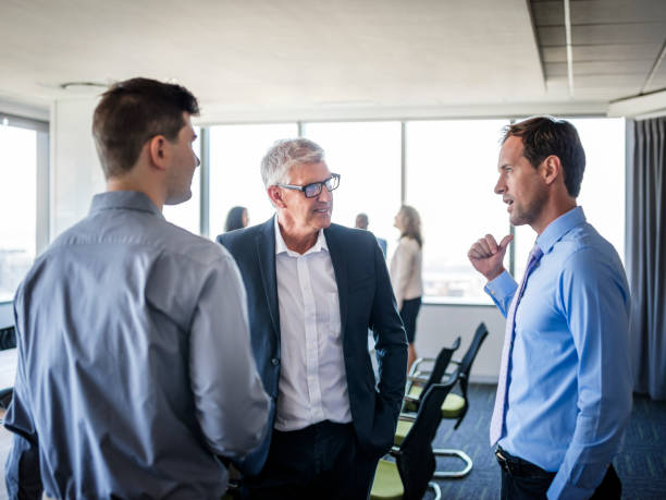istock Businessman brainstorming male colleagues 986574826