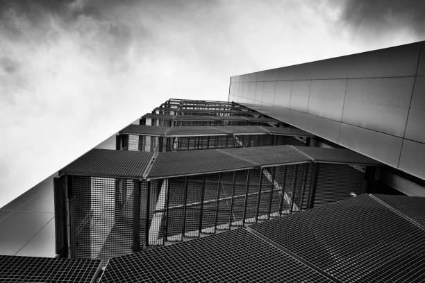 istock Low angle view architecture business building black and white 986588432