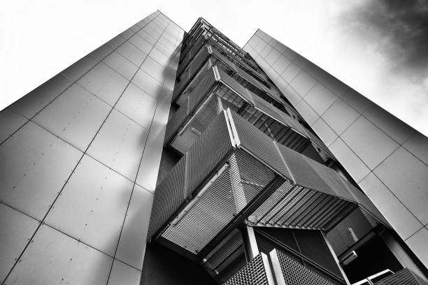 istock Low angle view architecture business building black and white 986588440