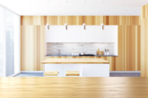 istock Wooden kitchen with a bar blur 986593614