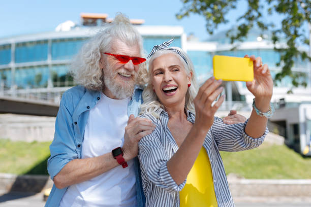 istock Cheerful positive woman taking a selfie 986593820