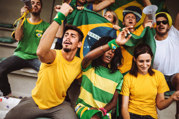 istock brazilian supporters have fun at the stadium 986604718