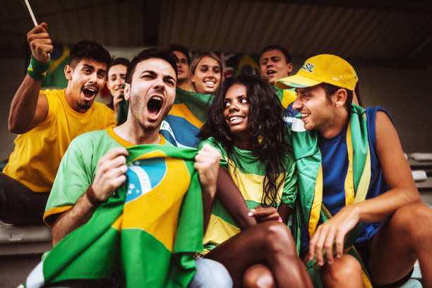 istock brazilian supporters have fun at the stadium 986605090