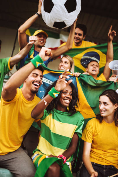 istock brazilian supporters have fun at the stadium 986605174
