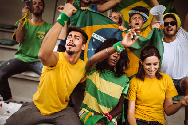 istock brazilian supporters have fun at the stadium 986605276