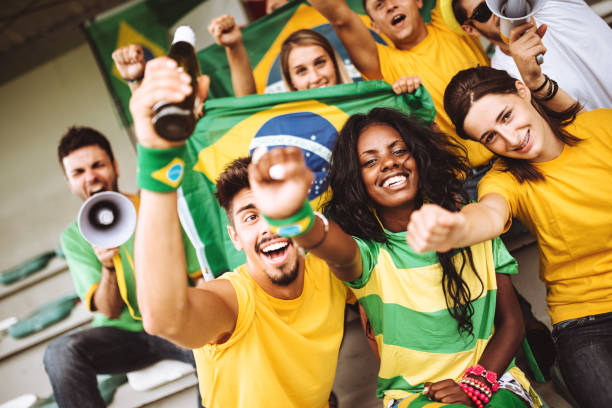 istock brazilian supporters have fun at the stadium 986605384