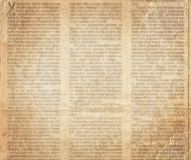istock Old vintage newspaper. Blurred texture background 986618378