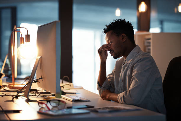 istock Putting in some overtime and feeling exhausted 986621142