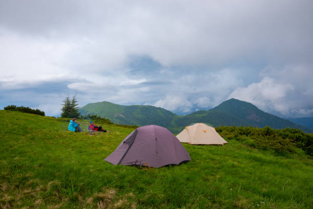 Adventurers rest and drink coffee