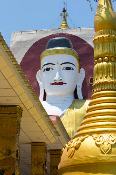 The 90 ft (27 m) statue depicting the four Buddhas at Kyaik Pun Pagoda in Bago.