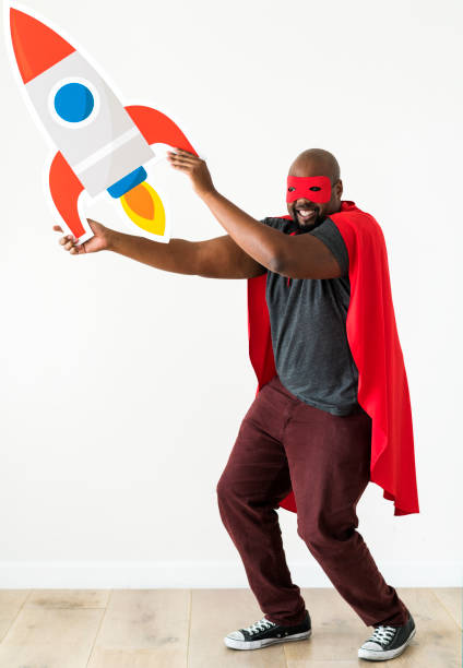 istock Launching small business with superhero concept 986627384