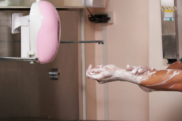 istock A surgeon scrubbing hands in operating room 986628176