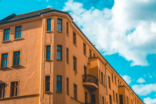istock corner building with high contrasted sky 986628248