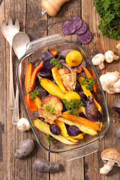 istock roasted vegetable on wood background 986628786