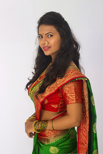 Stylish Indian Woman In Silk Saree And Nose Ring In A Side Pose Stock Photo - Download Image Now - iStock Stylish Indian Woman In Silk Saree And Nose Ring In A Side Pose Stock Photo - Download Image Now - iStock