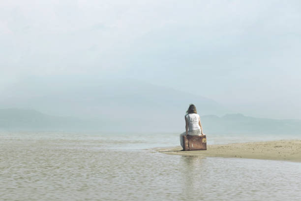 istock dreamer woman relaxing in a surreal atmosphere 986662652