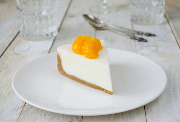 istock Cheesecake with slices of mandarin 986665508