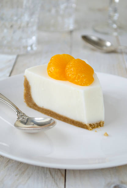 istock Cheesecake with slices of mandarin 986665640